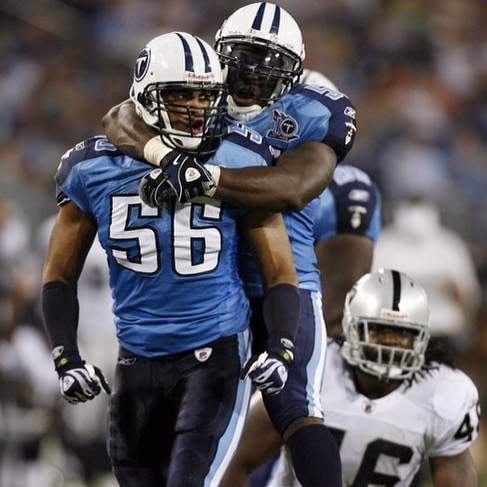 Colin Allred and his Tennessee Titans teammate celebrate during a game
